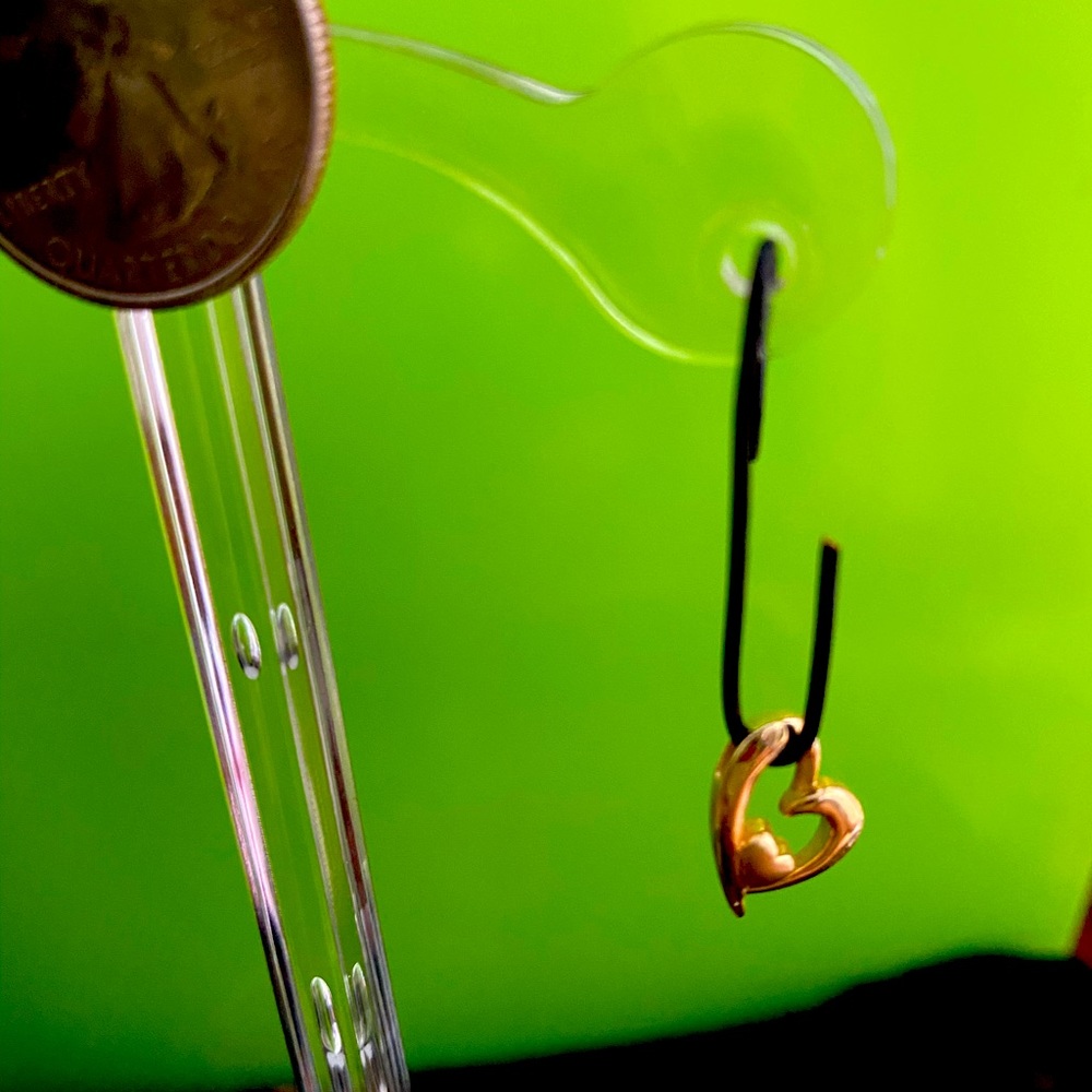 Dainty heart in heart 14 kt. yellow gold pendant.